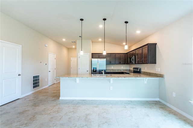 kitchen with stainless steel appliances, light stone counters, kitchen peninsula, pendant lighting, and lofted ceiling