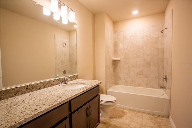 full bathroom with tile patterned floors, vanity, toilet, and tiled shower / bath