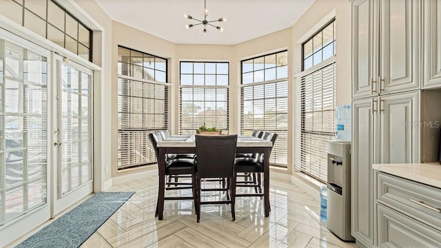 dining area with a notable chandelier