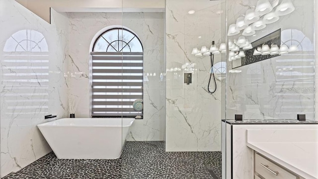 bathroom featuring tile walls and independent shower and bath