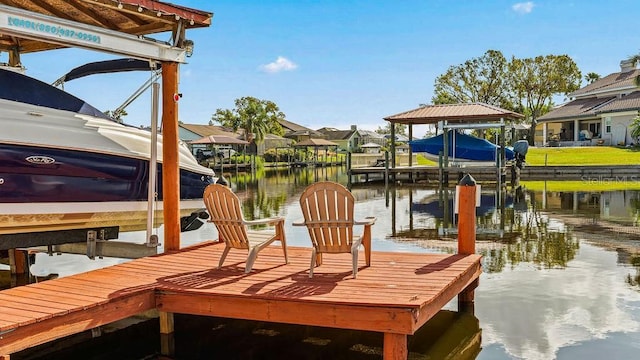 view of dock with a water view