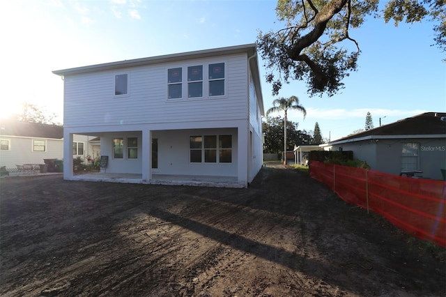 rear view of house featuring a patio