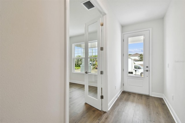 doorway featuring hardwood / wood-style flooring