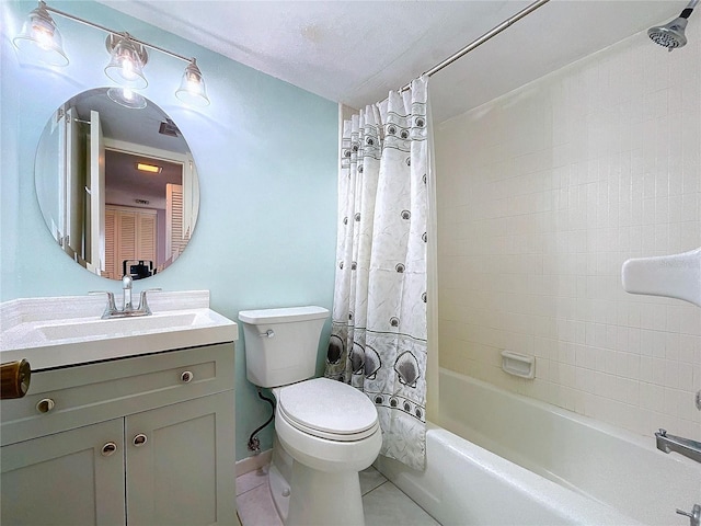 full bathroom featuring tile patterned flooring, vanity, shower / bath combo, and toilet