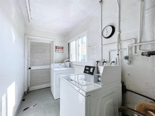 washroom featuring washer and dryer