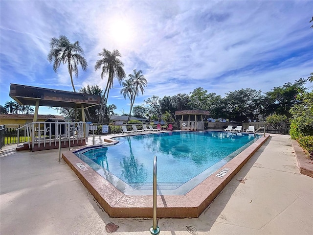 view of pool featuring a patio