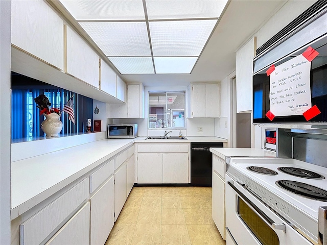 kitchen with sink, black dishwasher, light tile patterned flooring, white range with electric cooktop, and white cabinets