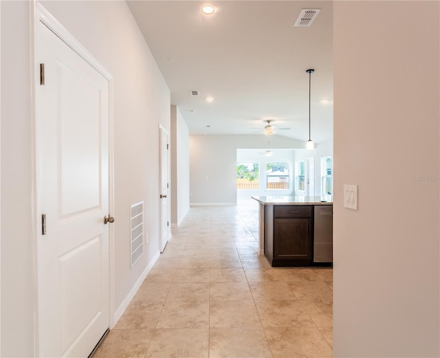 hall with light tile patterned flooring