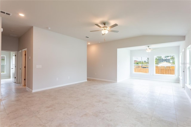 unfurnished room with ceiling fan, light tile patterned floors, and lofted ceiling