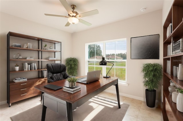 office space featuring ceiling fan and light tile patterned floors