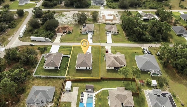 447 Reading St, Lehigh Acres, FL 33974 - aerial view of residential area with property parcel outlined and a pool