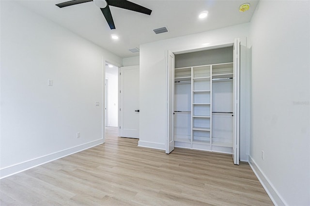 unfurnished bedroom with light wood finished floors, baseboards, visible vents, and recessed lighting