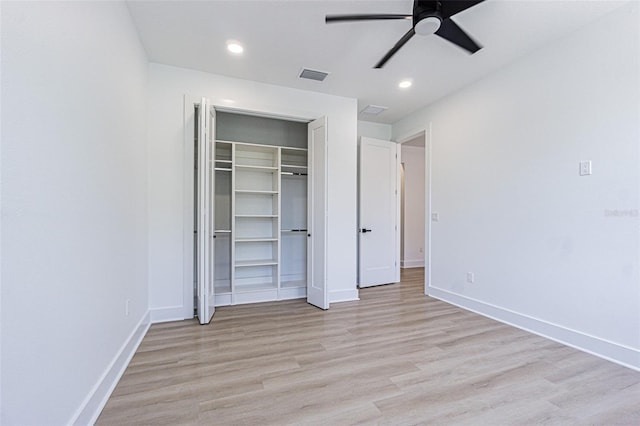 unfurnished bedroom with light wood-style floors, baseboards, visible vents, and recessed lighting