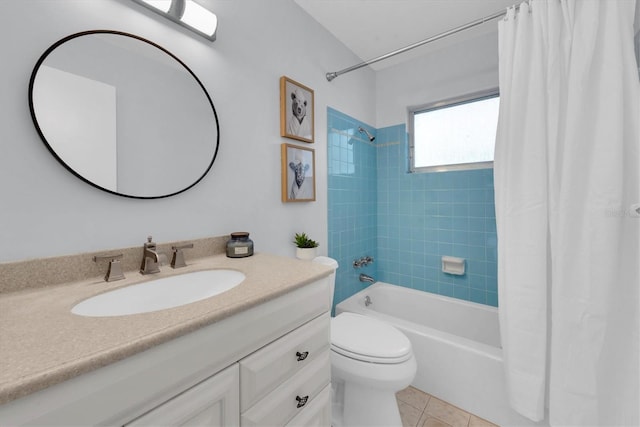 full bathroom with shower / bath combo with shower curtain, toilet, vanity, and tile patterned flooring