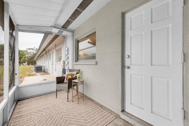 4444 Swift Rd Unit 20, Sarasota, FL 34231 - sunroom featuring beamed ceiling