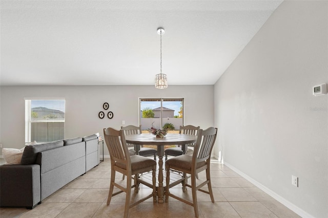 tiled dining area with a healthy amount of sunlight