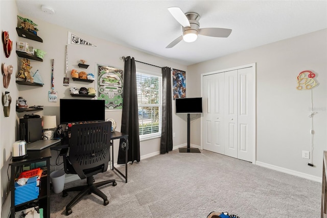 office with ceiling fan and light colored carpet