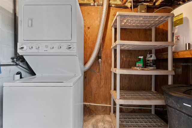 washroom with stacked washer and clothes dryer