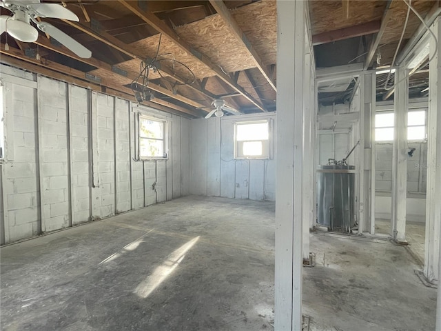 basement featuring ceiling fan