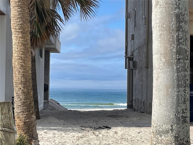 view of water feature with a beach view