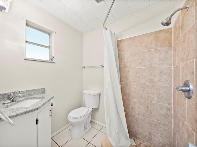 bathroom with tile patterned flooring, a shower with curtain, toilet, and vanity