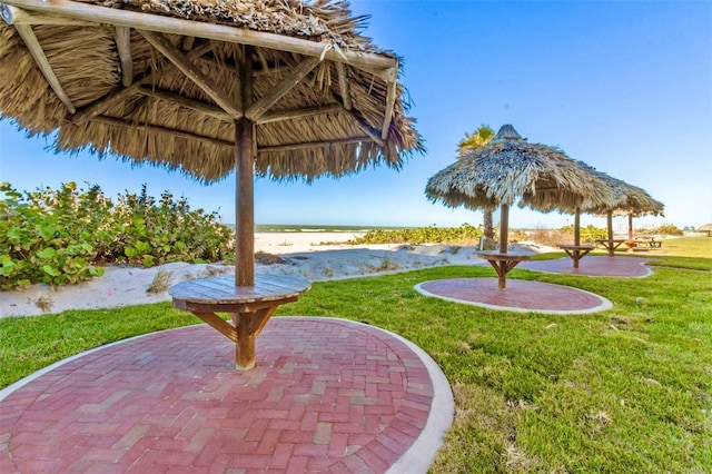 view of patio with a water view