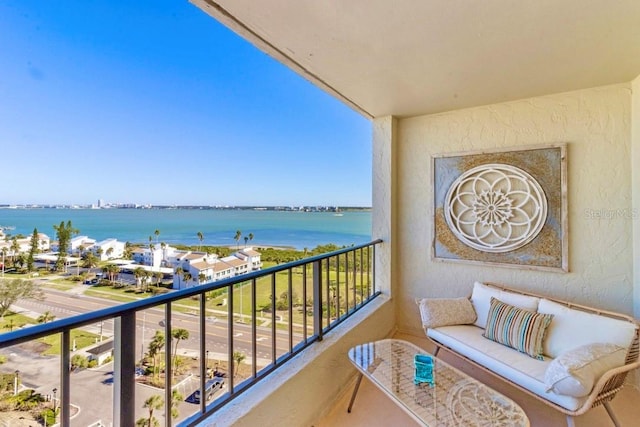 balcony featuring a water view