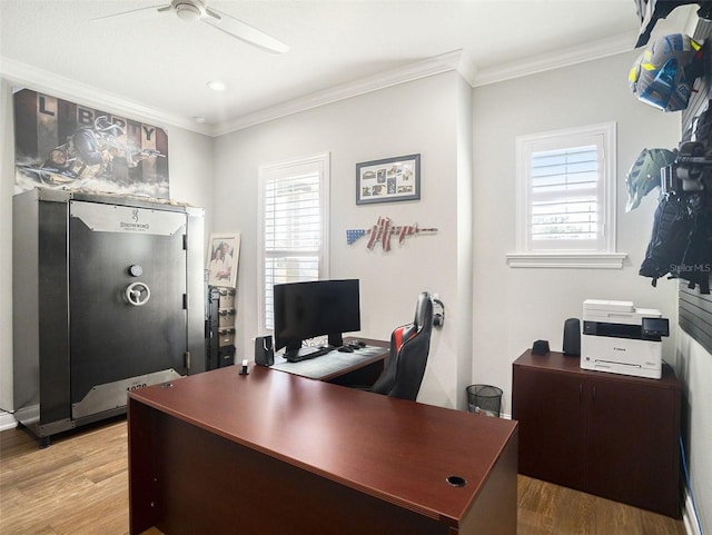 office area featuring hardwood / wood-style floors, ceiling fan, and crown molding