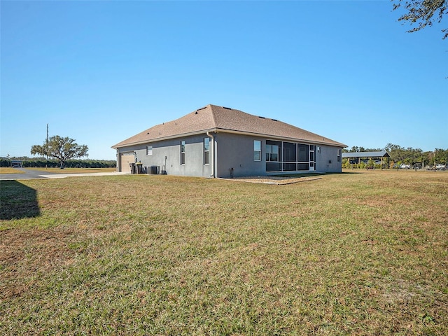 back of house with a yard