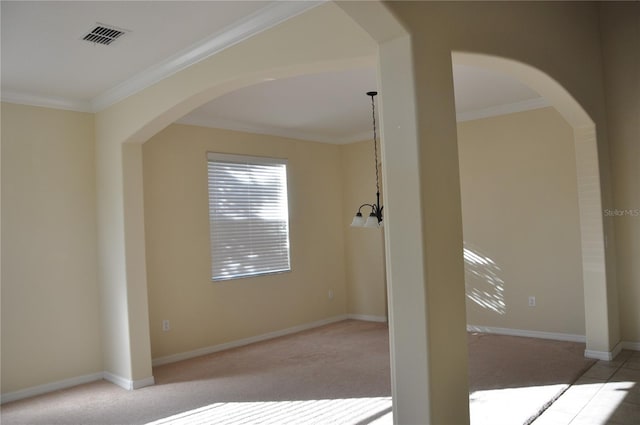 interior space with a chandelier and ornamental molding