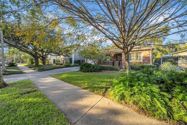 view of front of home with a front lawn