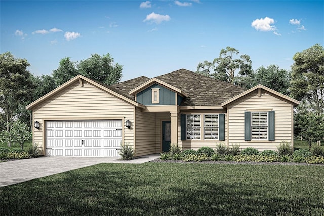 view of front of home featuring a front lawn and a garage