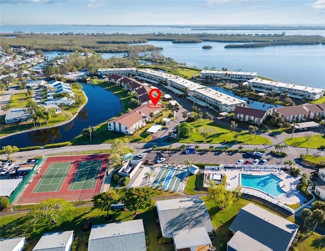 bird's eye view with a water view