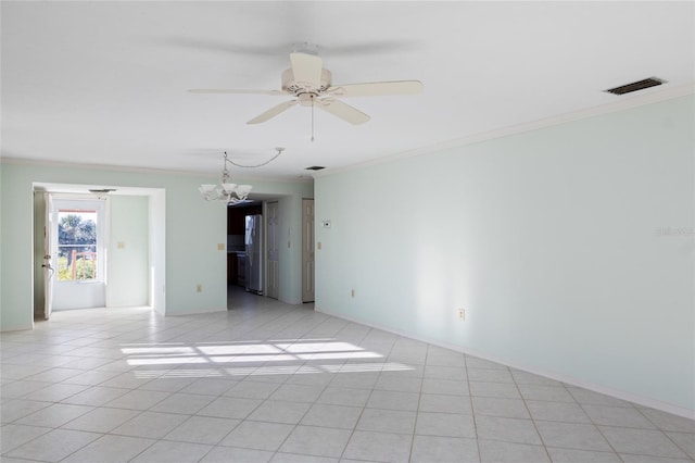 4859 Independence Dr, Bradenton, FL 34210 - unfurnished room featuring crown molding, a chandelier, a ceiling fan, light tile patterned flooring, and baseboards