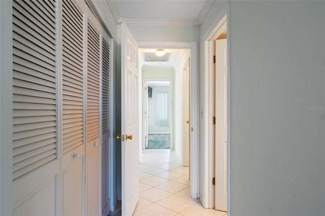 4859 Independence Dr, Bradenton, FL 34210 - hallway featuring light tile patterned flooring and crown molding