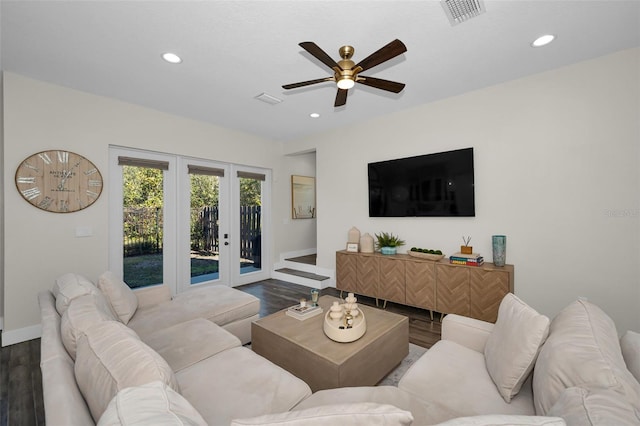 living room featuring ceiling fan, french doors, and wood-type flooring