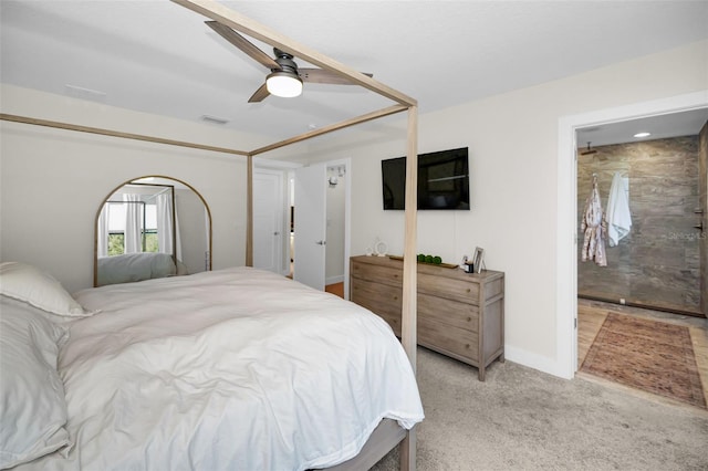 bedroom featuring ceiling fan and light colored carpet