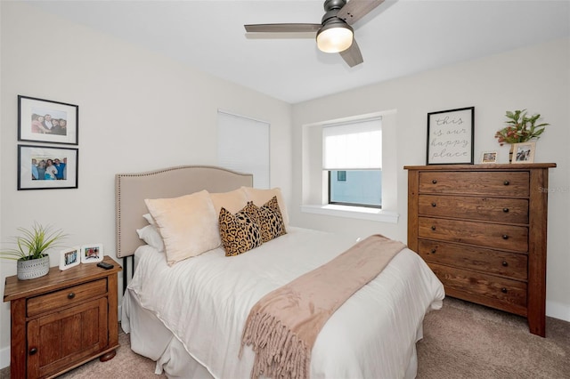 bedroom featuring ceiling fan and light colored carpet