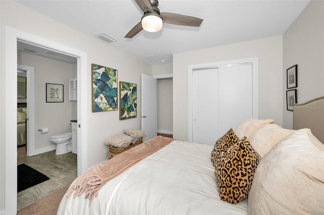 carpeted bedroom featuring connected bathroom, a closet, and ceiling fan