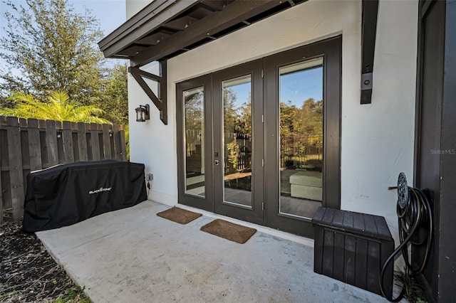 property entrance featuring french doors