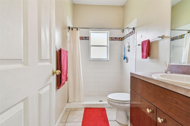 bathroom with tile patterned floors, vanity, curtained shower, and toilet