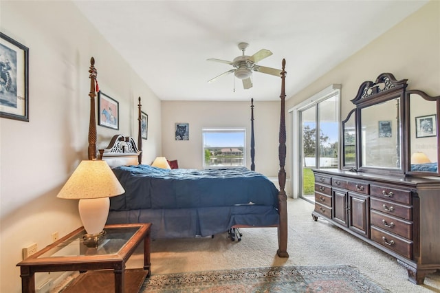 bedroom featuring ceiling fan and light colored carpet