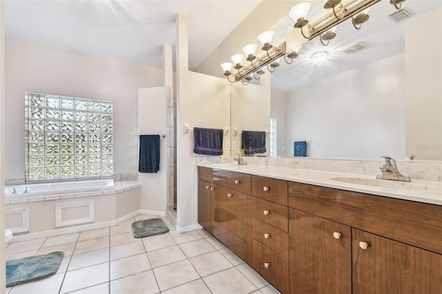 bathroom featuring plus walk in shower, tile patterned flooring, and vanity