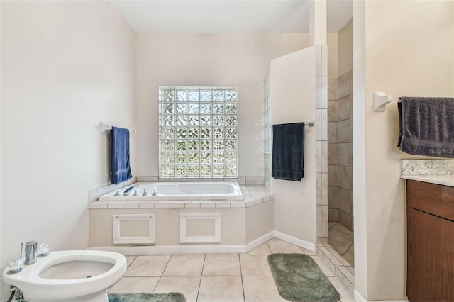 bathroom featuring tile patterned floors, a bidet, and independent shower and bath