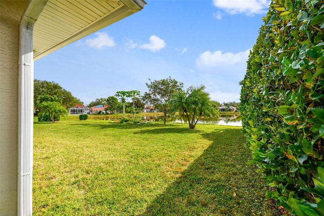 view of yard with a water view