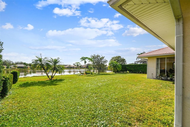 view of yard with a water view