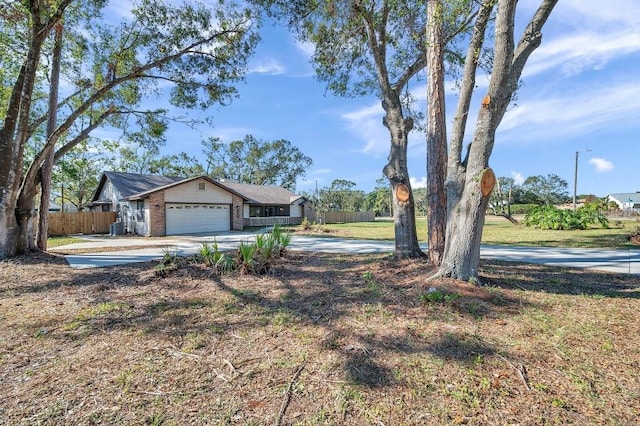 view of yard featuring a garage