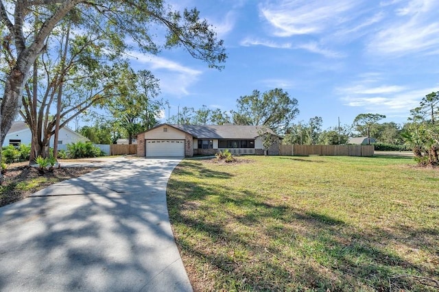 single story home with a front lawn and a garage