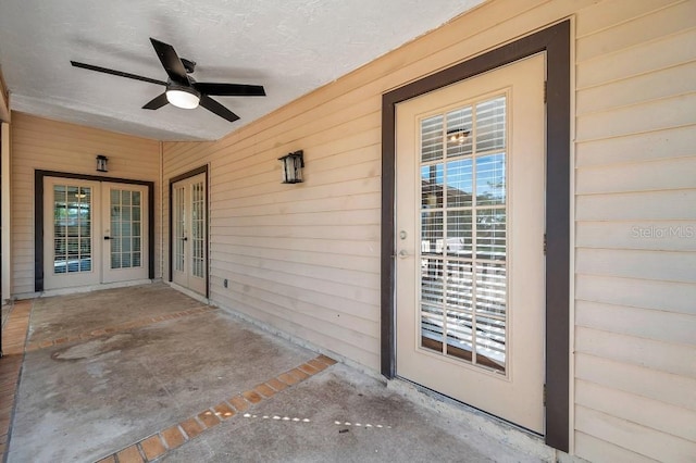 exterior space featuring french doors and ceiling fan