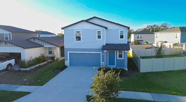 view of front facade with a front lawn and a garage